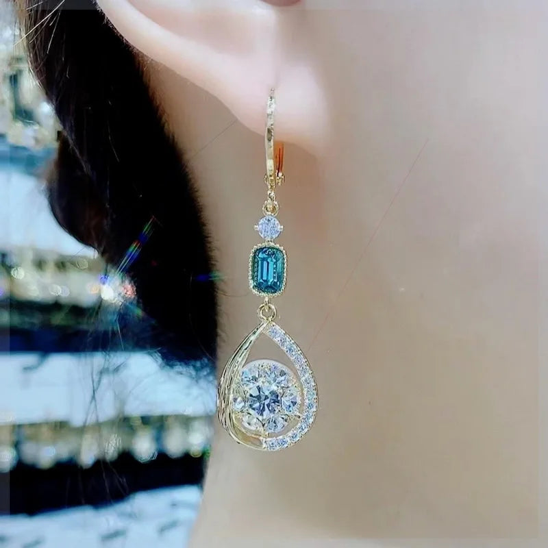 Radiant Halo Teardrop Earrings